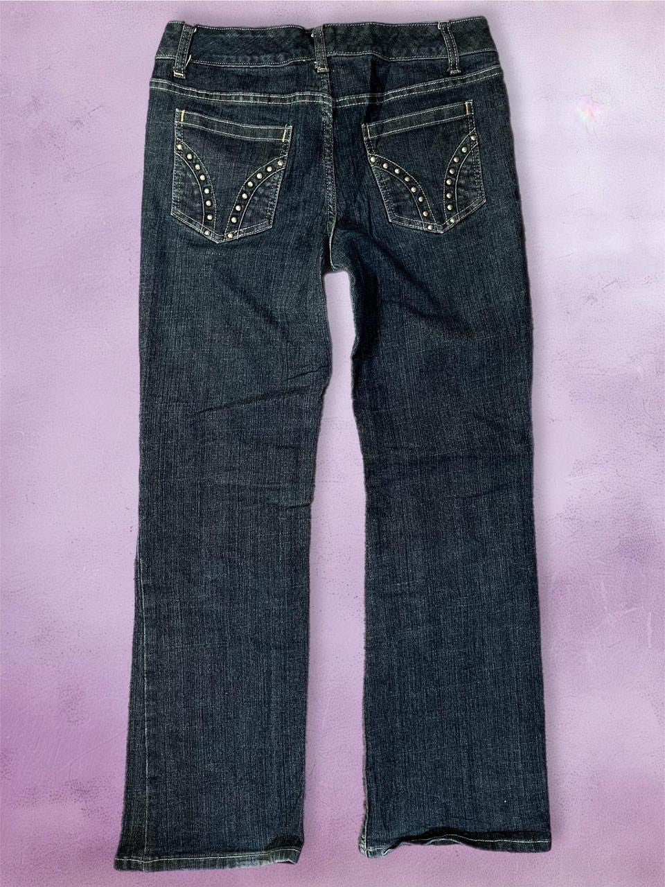 Low rise bootcut jeans with studded pockets
