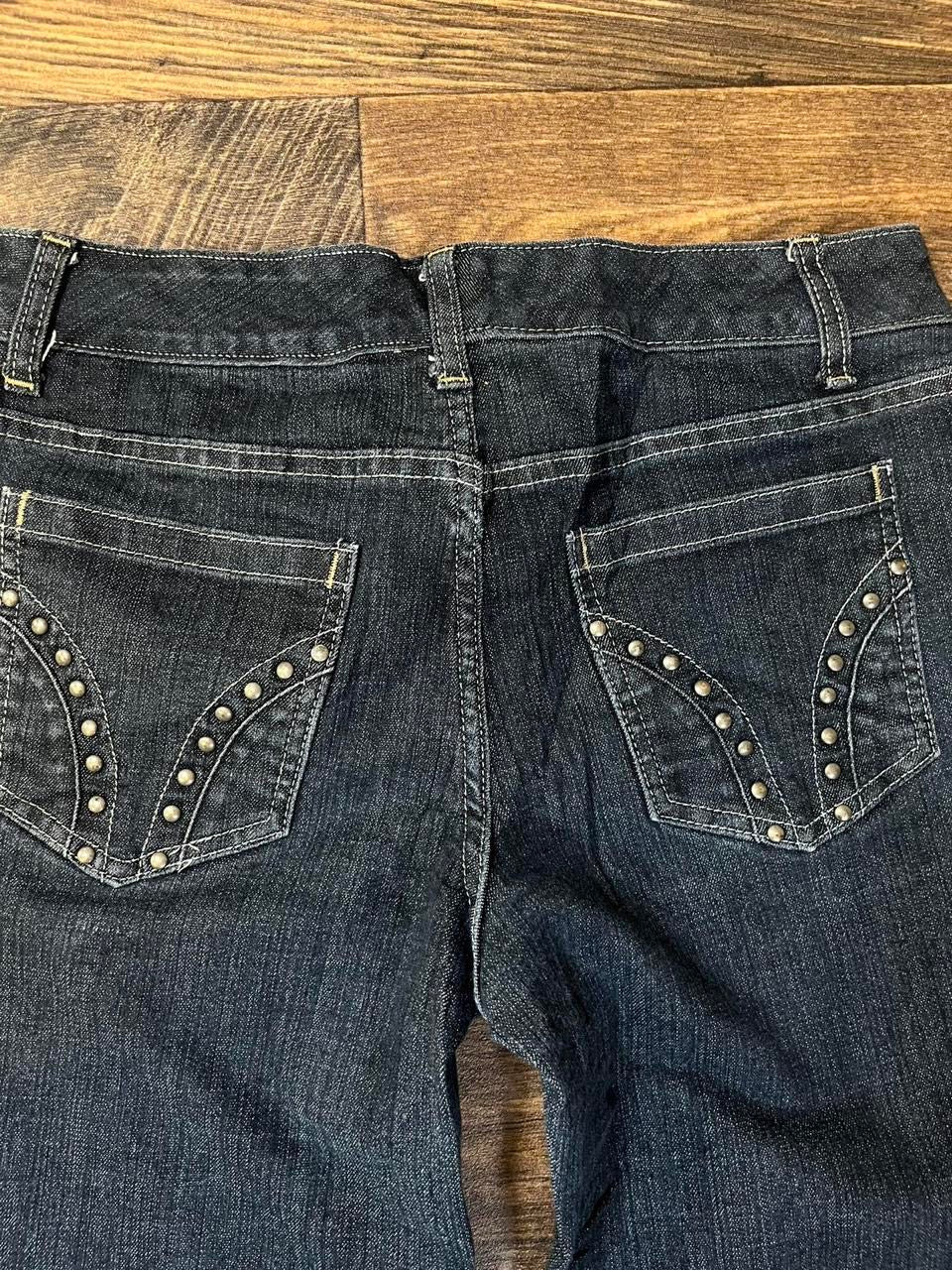 Low rise bootcut jeans with studded pockets