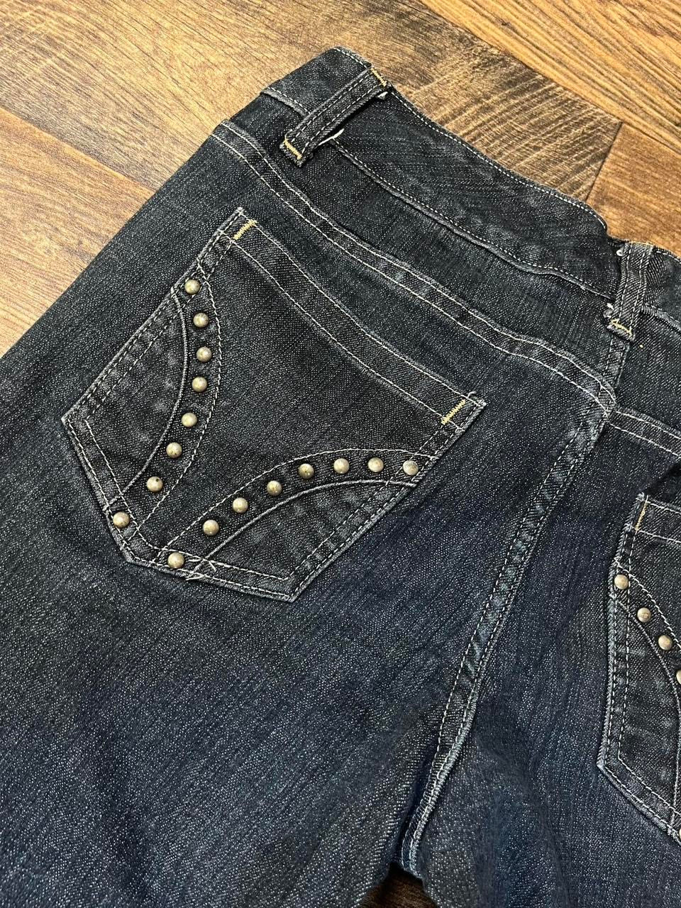 Low rise bootcut jeans with studded pockets