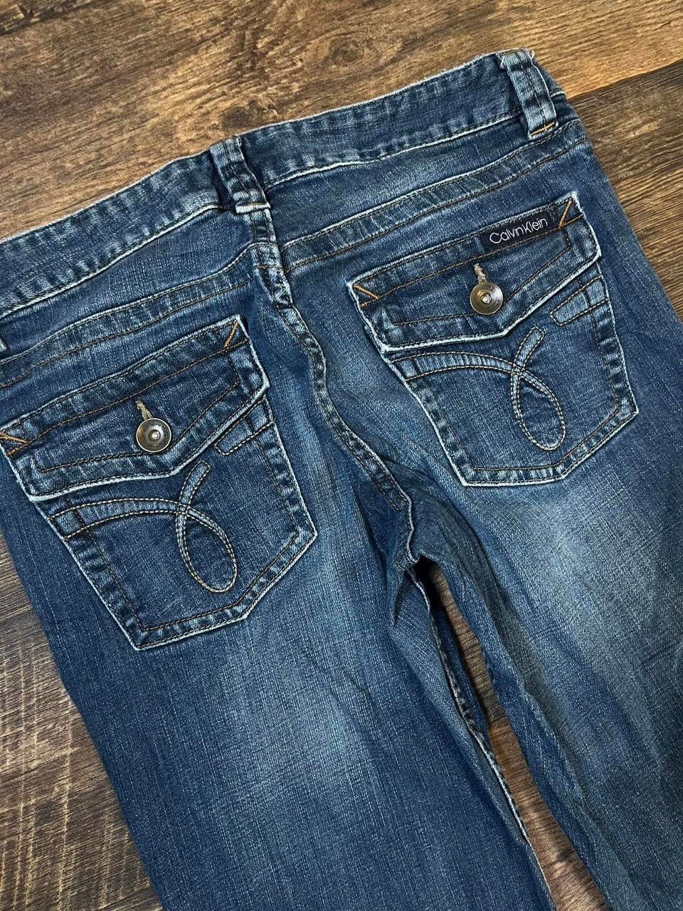 Low rise Calvin Klein bootcut jeans with embroidered pockets
