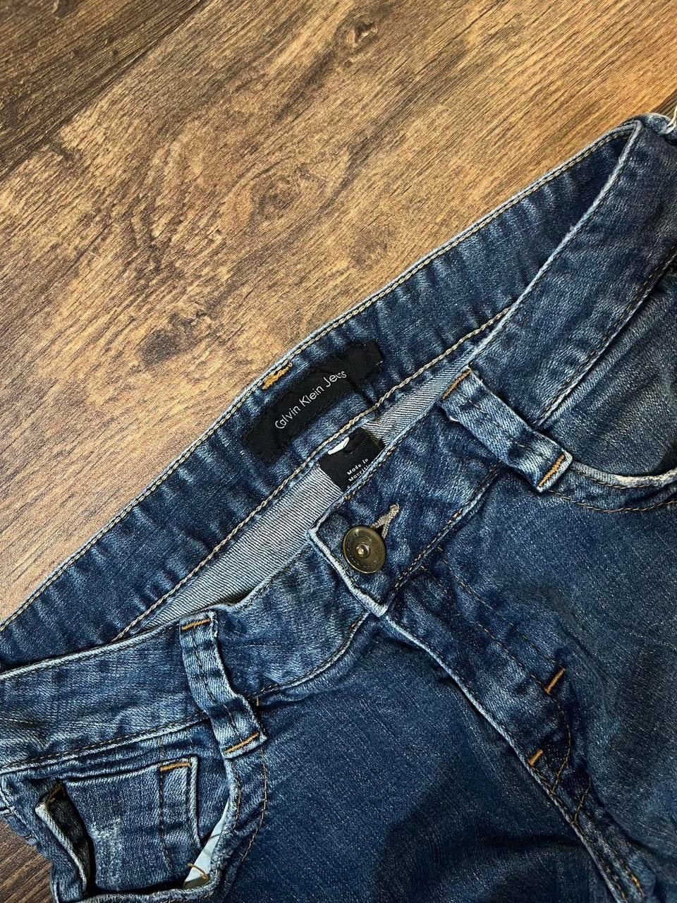 Low rise Calvin Klein bootcut jeans with embroidered pockets