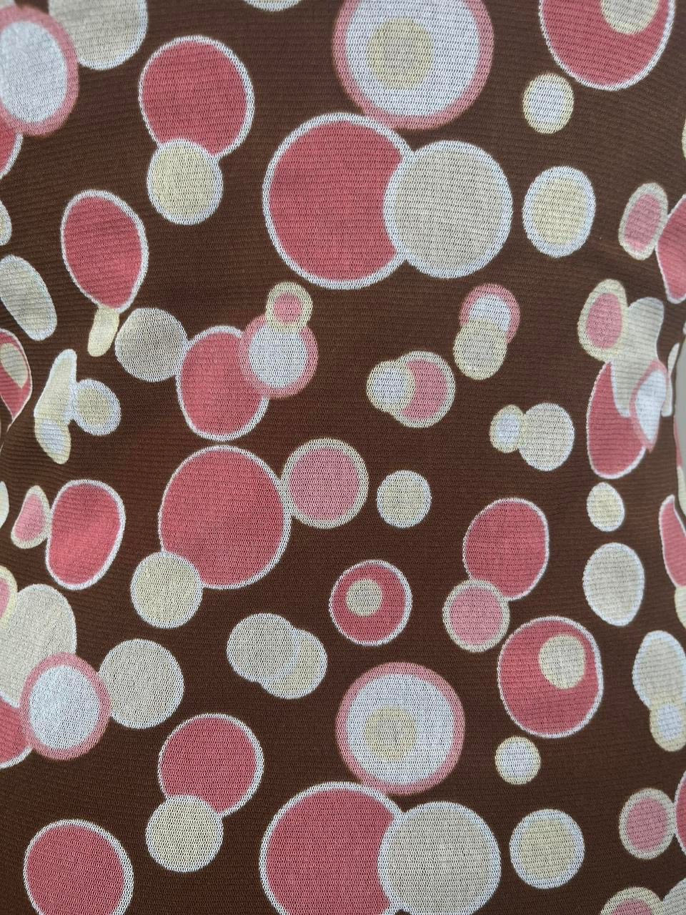 Polka dot cami top with ruffled trim