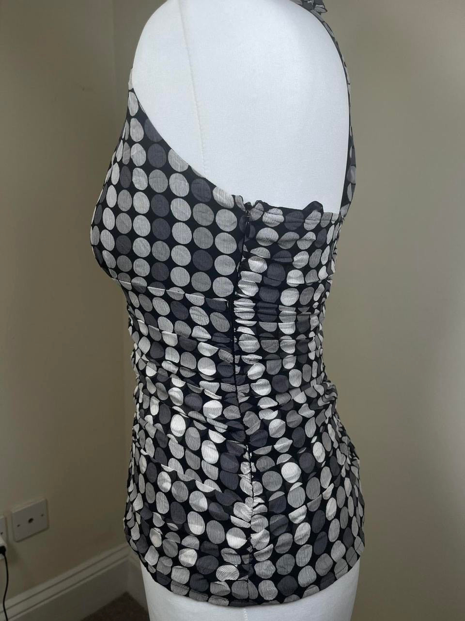 Polka dot halter neck top with ruffles