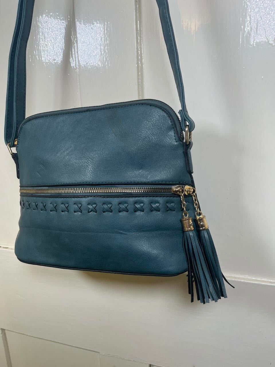 Crossbody bag with tassels