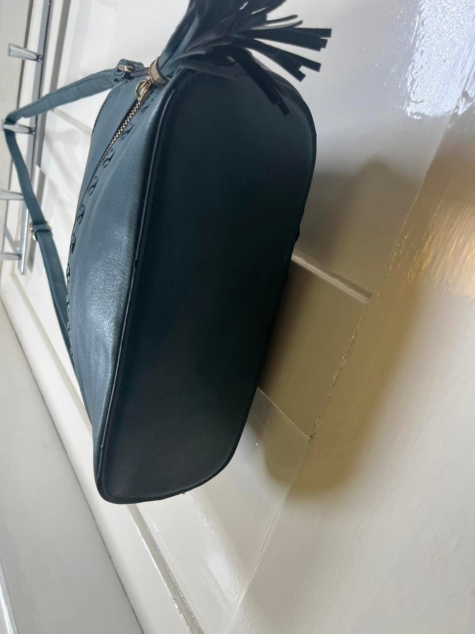 Crossbody bag with tassels