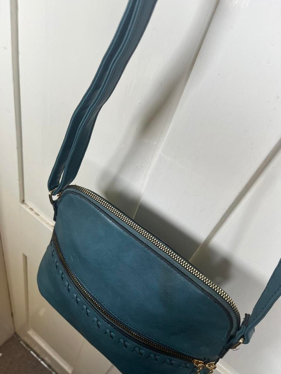 Crossbody bag with tassels