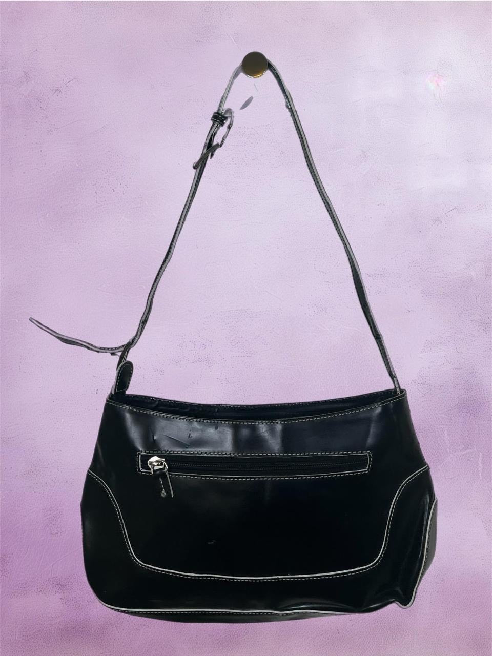 Leather shoulder bag with white stitching